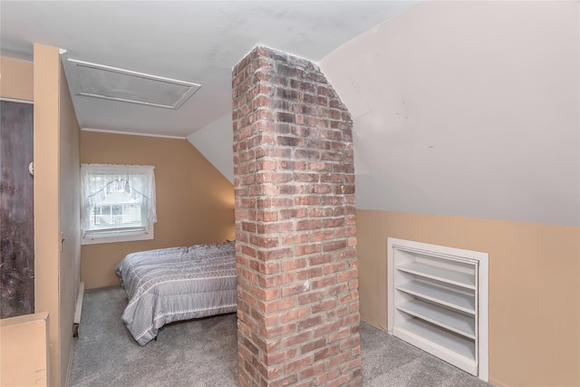 carpeted bedroom featuring attic access and lofted ceiling