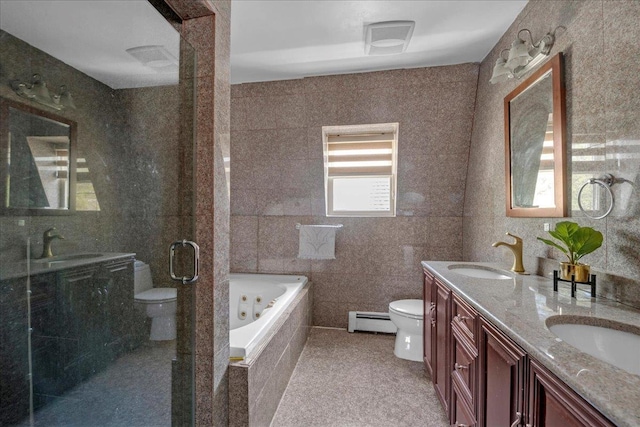 bathroom featuring a tub with jets, a baseboard radiator, a sink, and toilet