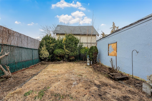 view of yard with fence