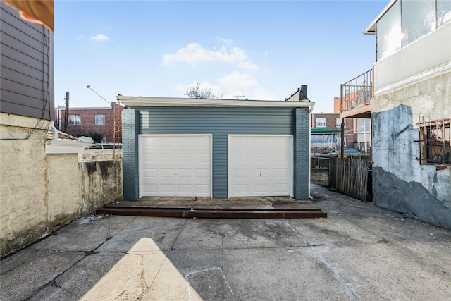 garage featuring fence