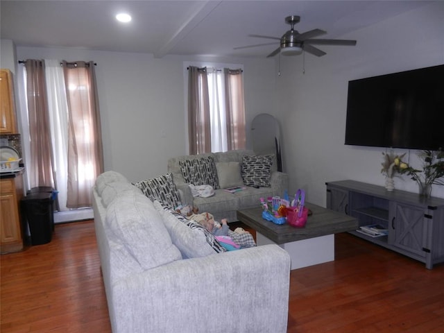 living area featuring recessed lighting, ceiling fan, baseboard heating, and wood finished floors