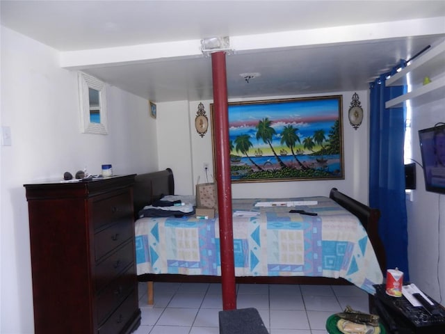 bedroom featuring light tile patterned floors