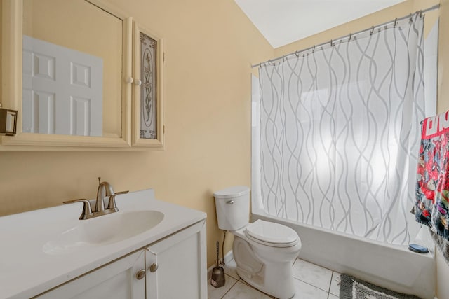 bathroom featuring tile patterned flooring, shower / tub combo with curtain, vanity, and toilet