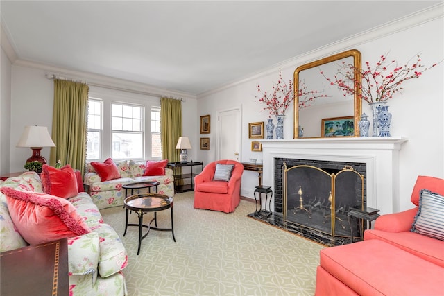 living area featuring ornamental molding and a fireplace