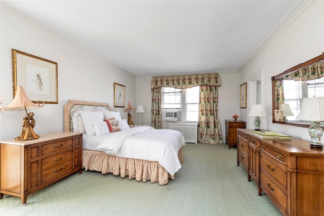 bedroom with ornamental molding, cooling unit, and light colored carpet