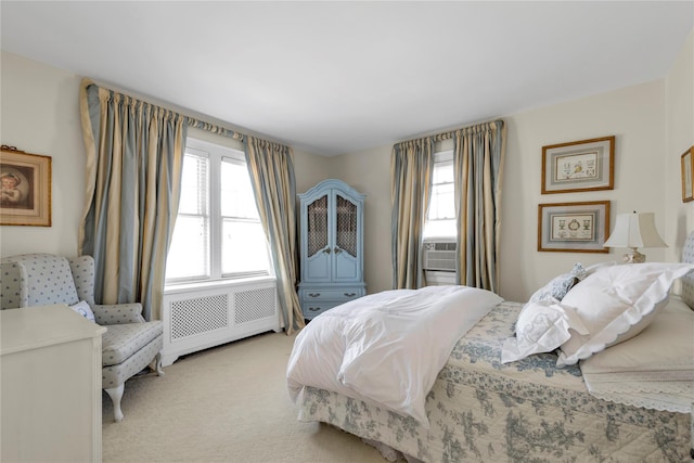 carpeted bedroom with radiator