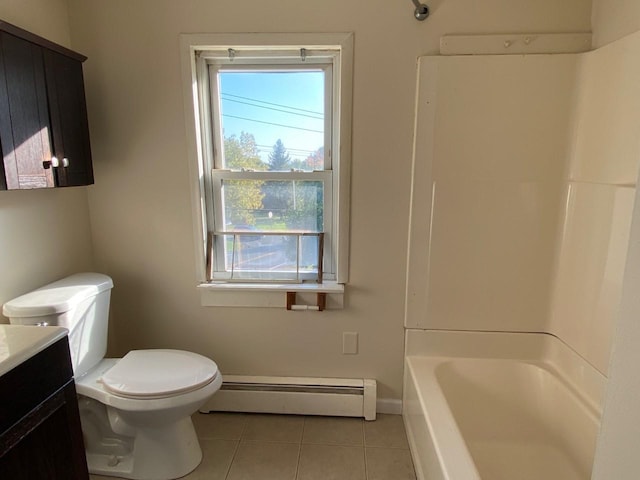 bathroom with baseboards, toilet, tile patterned floors, vanity, and a baseboard heating unit