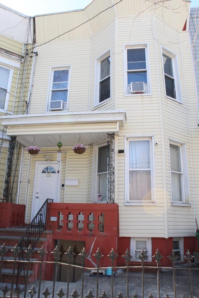 view of property with a porch