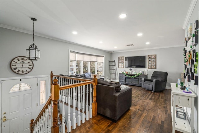 living area featuring ornamental molding, dark wood-style flooring, and recessed lighting