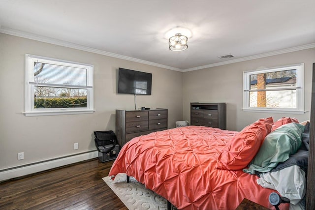 bedroom with dark wood-type flooring, visible vents, and ornamental molding