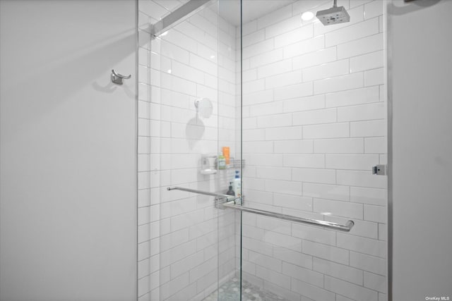 bathroom with a stall shower