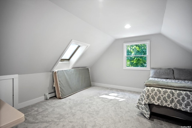 bedroom featuring carpet, a baseboard radiator, baseboards, and vaulted ceiling