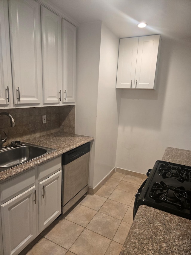 kitchen with a sink, white cabinets, stainless steel dishwasher, tasteful backsplash, and black gas range oven