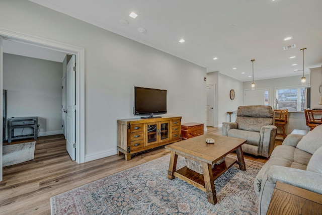 4109 Fox Hill Dr Unit 4109, Baiting Hollow, NY 11933 - living room with recessed lighting, wood finished floors, visible vents, and baseboards