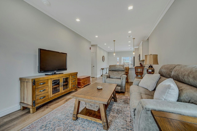 4109 Fox Hill Dr Unit 4109, Baiting Hollow, NY 11933 - living room with ornamental molding, recessed lighting, light wood-style flooring, and baseboards
