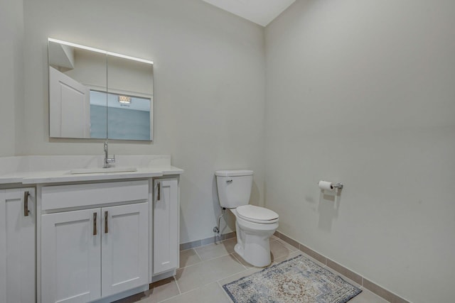 4109 Fox Hill Dr Unit 4109, Baiting Hollow, NY 11933 - bathroom featuring tile patterned flooring, baseboards, vanity, and toilet