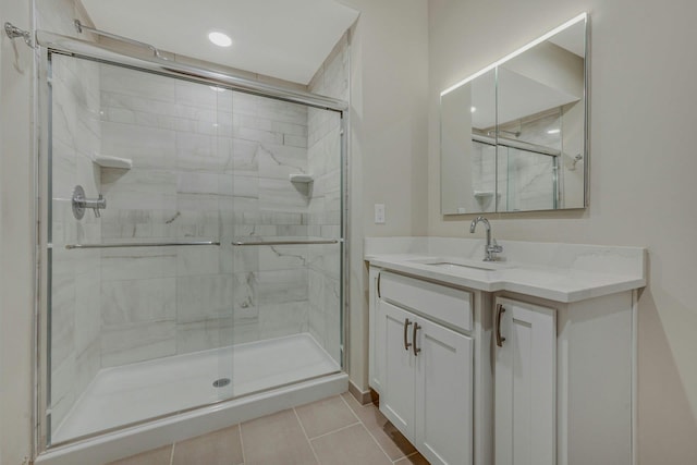 4109 Fox Hill Dr Unit 4109, Baiting Hollow, NY 11933 - full bath featuring a stall shower, vanity, and tile patterned floors