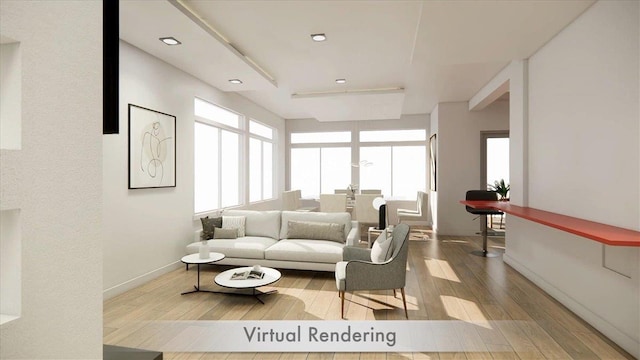 living area with wood finished floors and baseboards