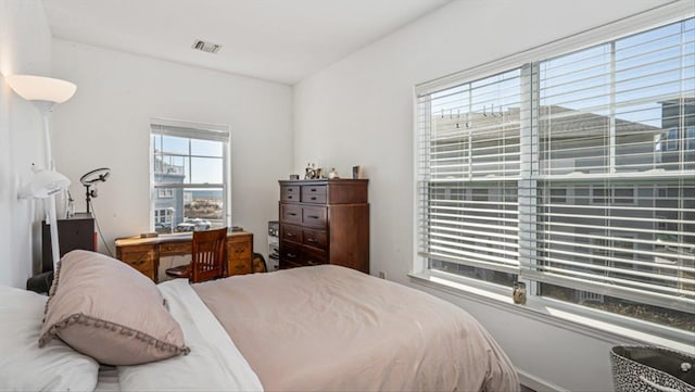 bedroom with visible vents