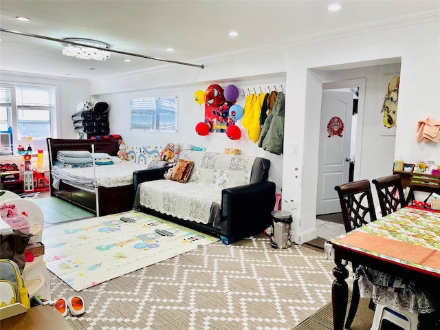 interior space with ornamental molding and recessed lighting