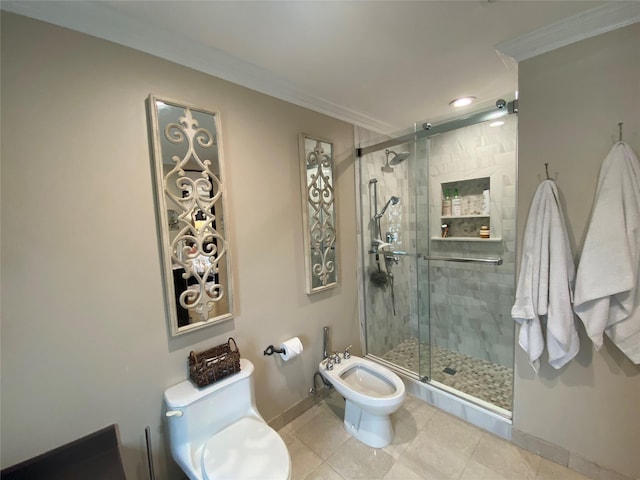 bathroom with baseboards, ornamental molding, a bidet, and toilet