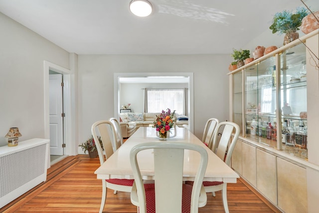 dining area with light wood-style floors