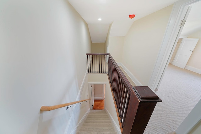 stairway with carpet, baseboards, and recessed lighting