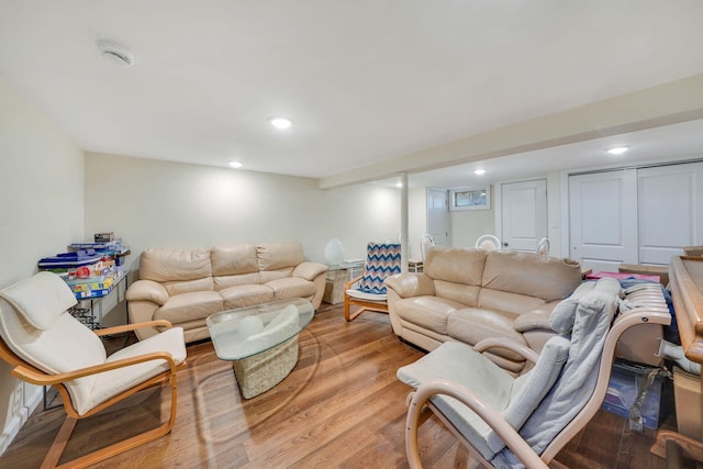 living area featuring recessed lighting and light wood-style flooring