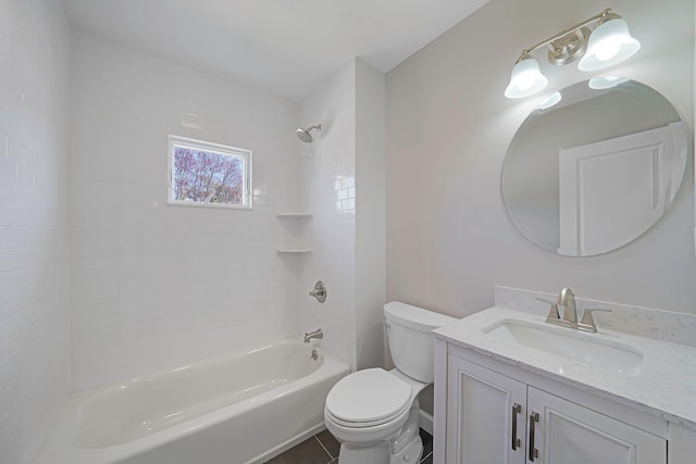 bathroom featuring toilet, bathing tub / shower combination, tile patterned flooring, and vanity