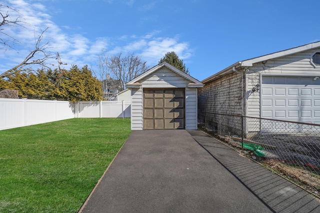 view of shed featuring a fenced backyard