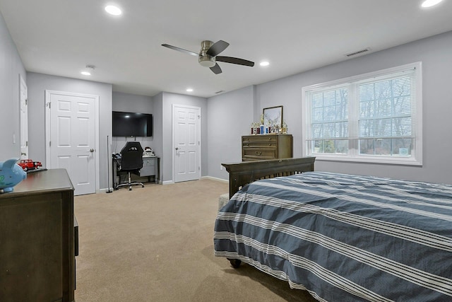 bedroom with visible vents, baseboards, a ceiling fan, light colored carpet, and recessed lighting