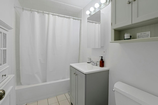 full bathroom with toilet, tile patterned flooring, shower / bathtub combination with curtain, and vanity