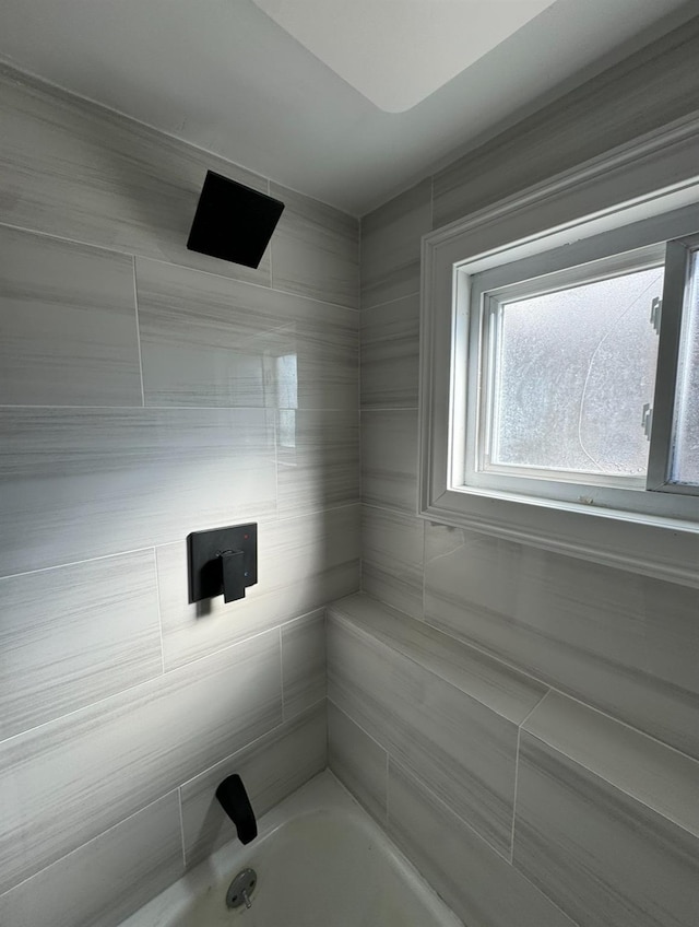 bathroom featuring shower / washtub combination