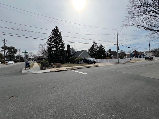 view of street featuring sidewalks and curbs