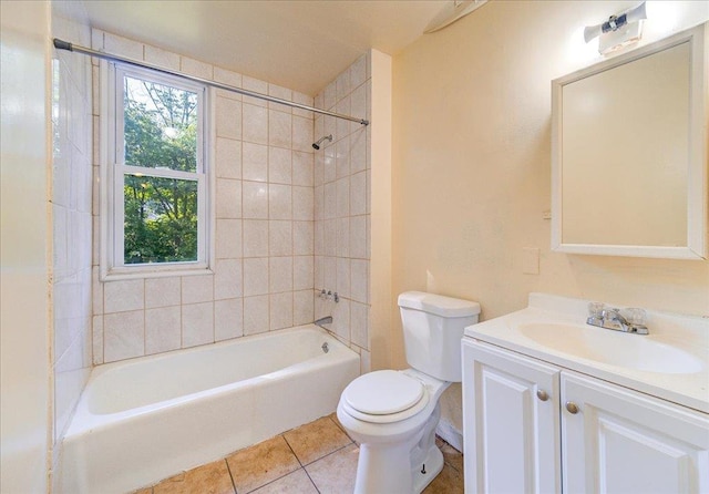 bathroom featuring shower / washtub combination, tile patterned flooring, vanity, and toilet