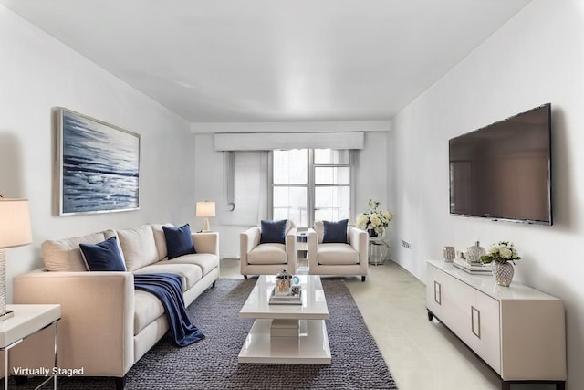 living area with light colored carpet