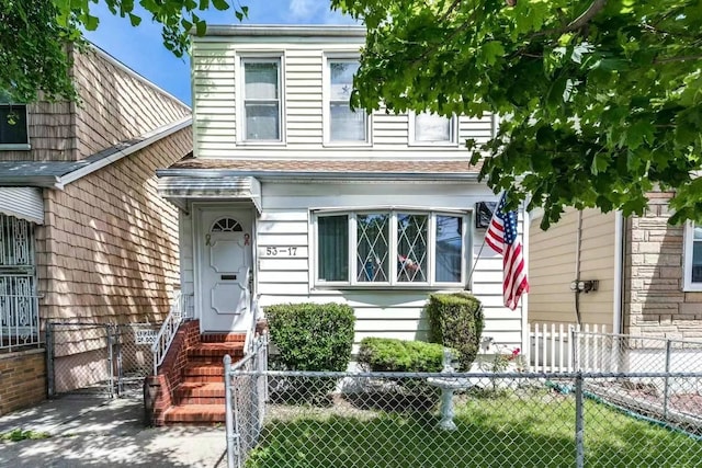 view of front of house with fence