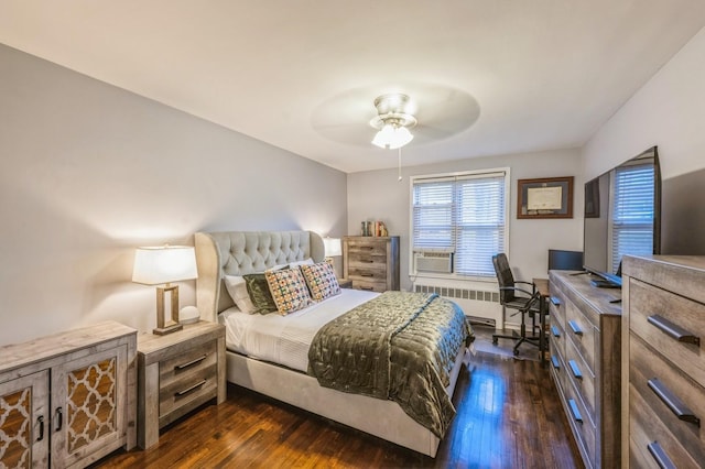 bedroom featuring radiator heating unit, a ceiling fan, dark wood finished floors, and cooling unit