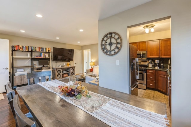 dining area featuring recessed lighting