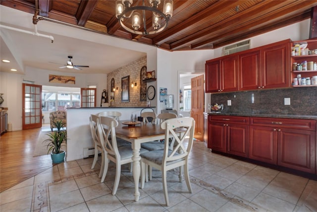 dining space with ceiling fan with notable chandelier, wood ceiling, beam ceiling, and light tile patterned floors