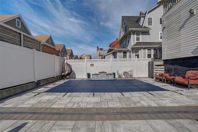 view of patio with a fenced backyard