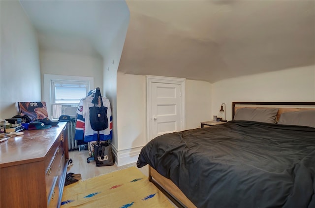 bedroom with wood finished floors