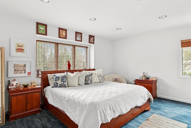 bedroom featuring baseboards and recessed lighting