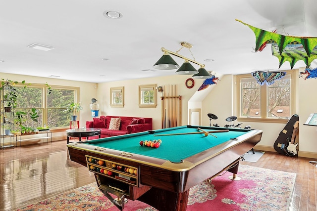 game room featuring hardwood / wood-style flooring, billiards, visible vents, and baseboards