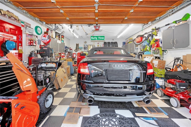 garage featuring a garage door opener