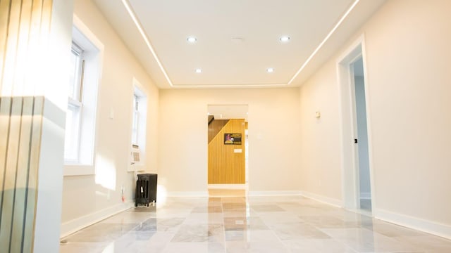 unfurnished room with recessed lighting and baseboards