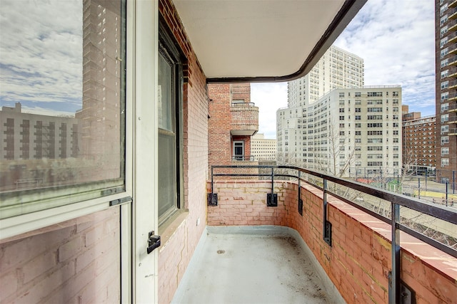 balcony featuring a city view