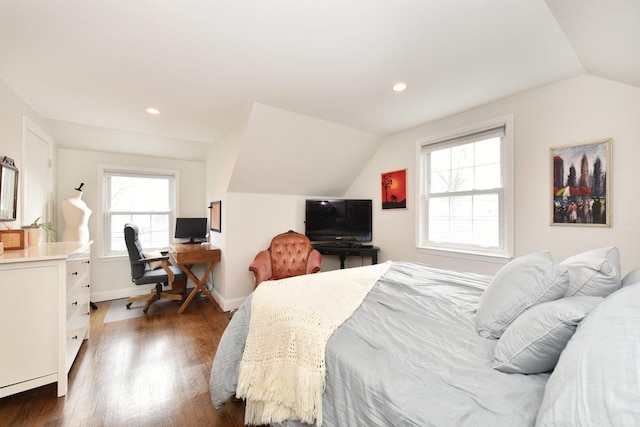 bedroom with dark wood-style floors, recessed lighting, lofted ceiling, and baseboards