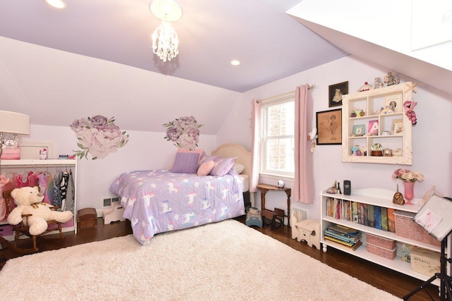 bedroom featuring recessed lighting, visible vents, vaulted ceiling, wood finished floors, and a chandelier