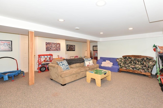 living area featuring carpet flooring and recessed lighting